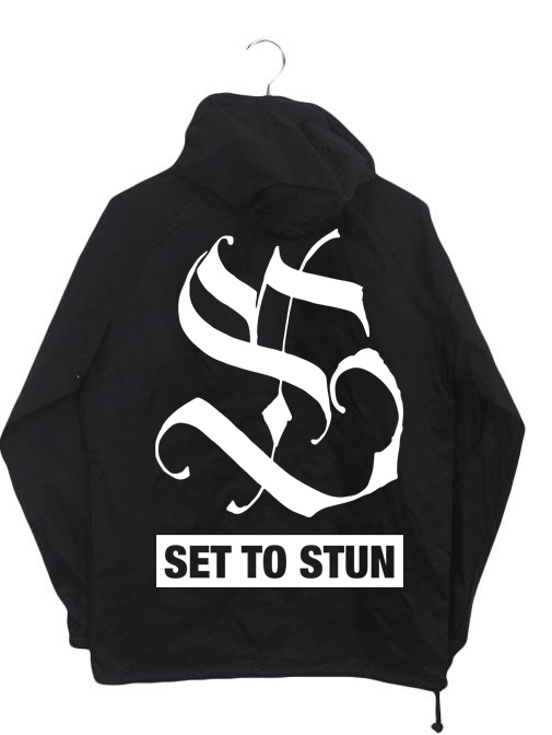Back of black SET TO STUN windbreaker